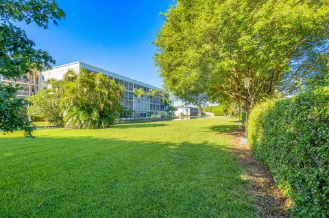a view of swimming pool with an outdoor space and seating area