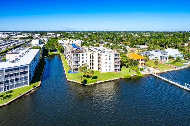 a view of a swimming pool with an ocean view