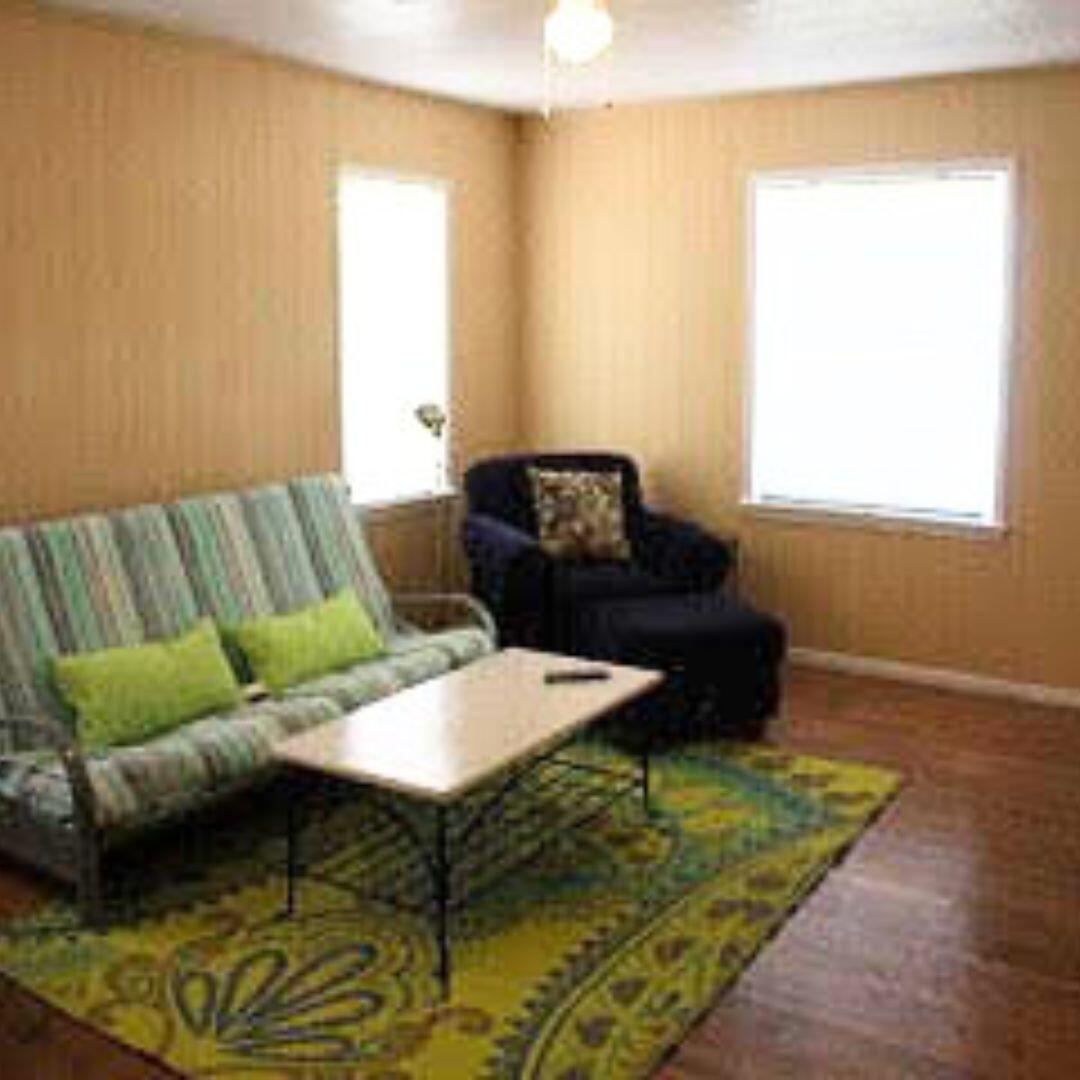 2123 25th Street Lubbock, TX 79411 - Photo 2 of 12 a living room with furniture and a window