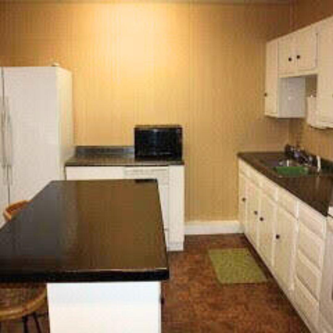 2123 25th Street Lubbock, TX 79411 - Photo 3 of 12 a view of cabinets and sink