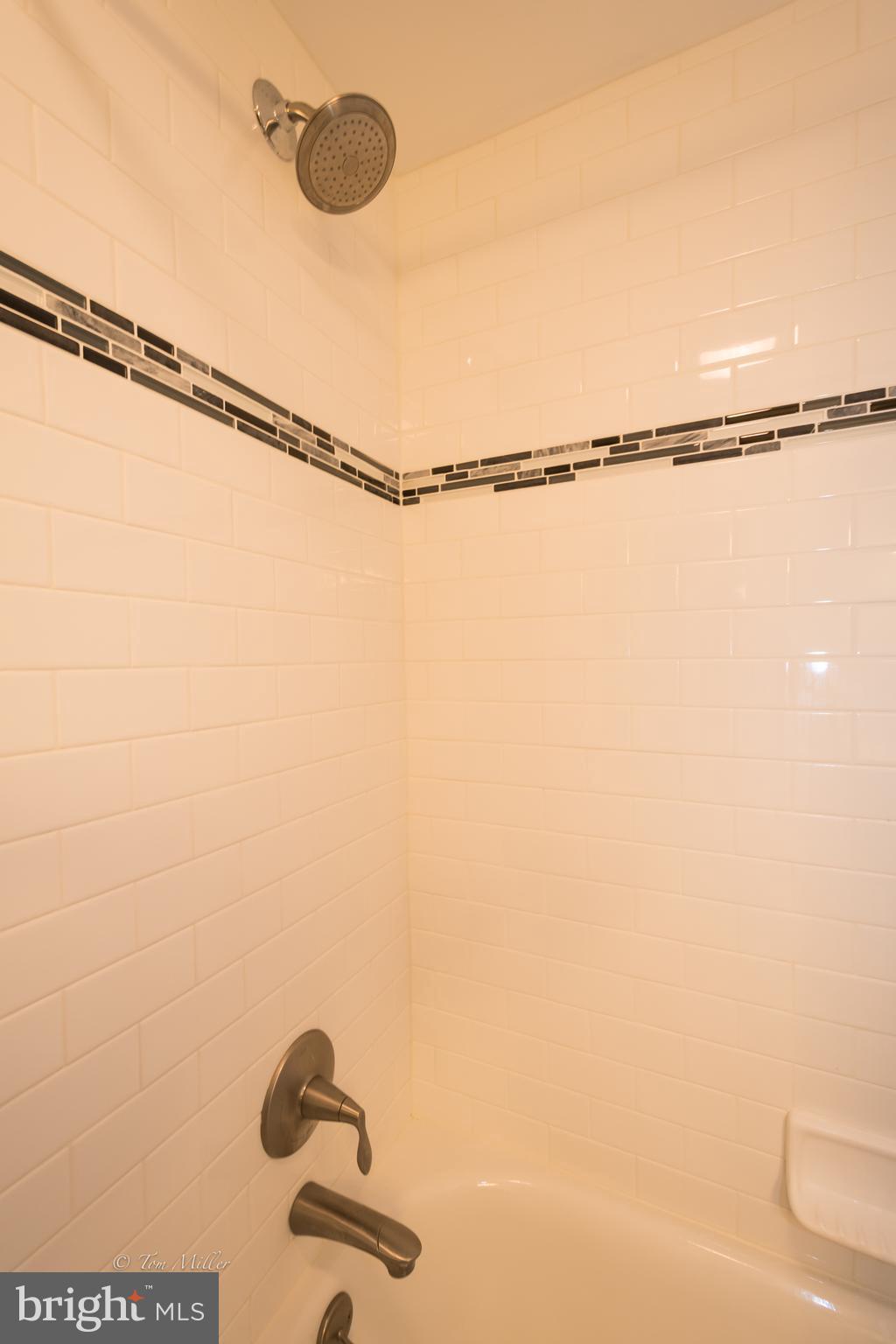 118 Cross Keys Road, Unit R118A Baltimore, MD 21210 - Photo 15 of 20 a bathroom with a shower