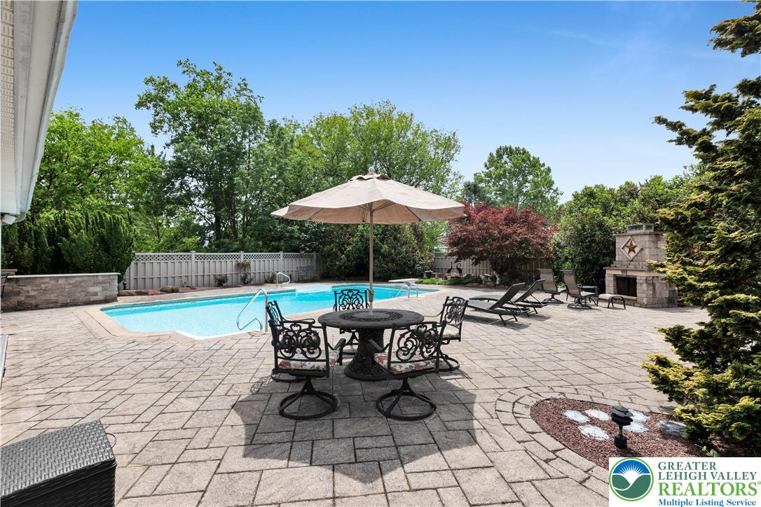 3830 McIntosh Drive Orefield, PA 18069 - Photo 29 of 36 a view of backyard with seating space and trees