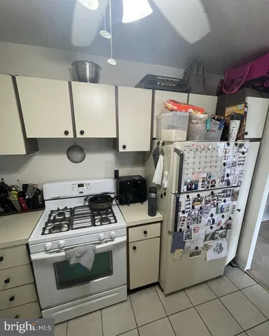 a kitchen with a stove and a microwave