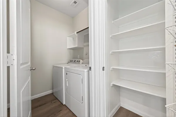 a view of a room with racks on the wall