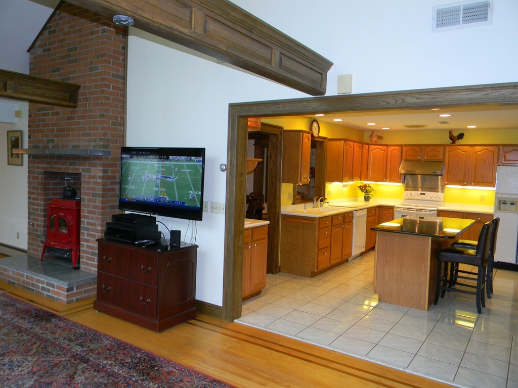 1170 Florence Road Northampton, MA 01062 - Photo 13 of 25 a living room with furniture and a flat screen tv