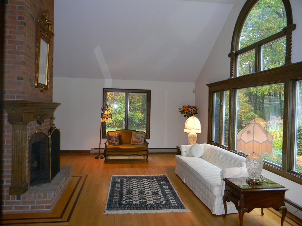 1170 Florence Road Northampton, MA 01062 - Photo 19 of 25 a living room with furniture fireplace and a large window