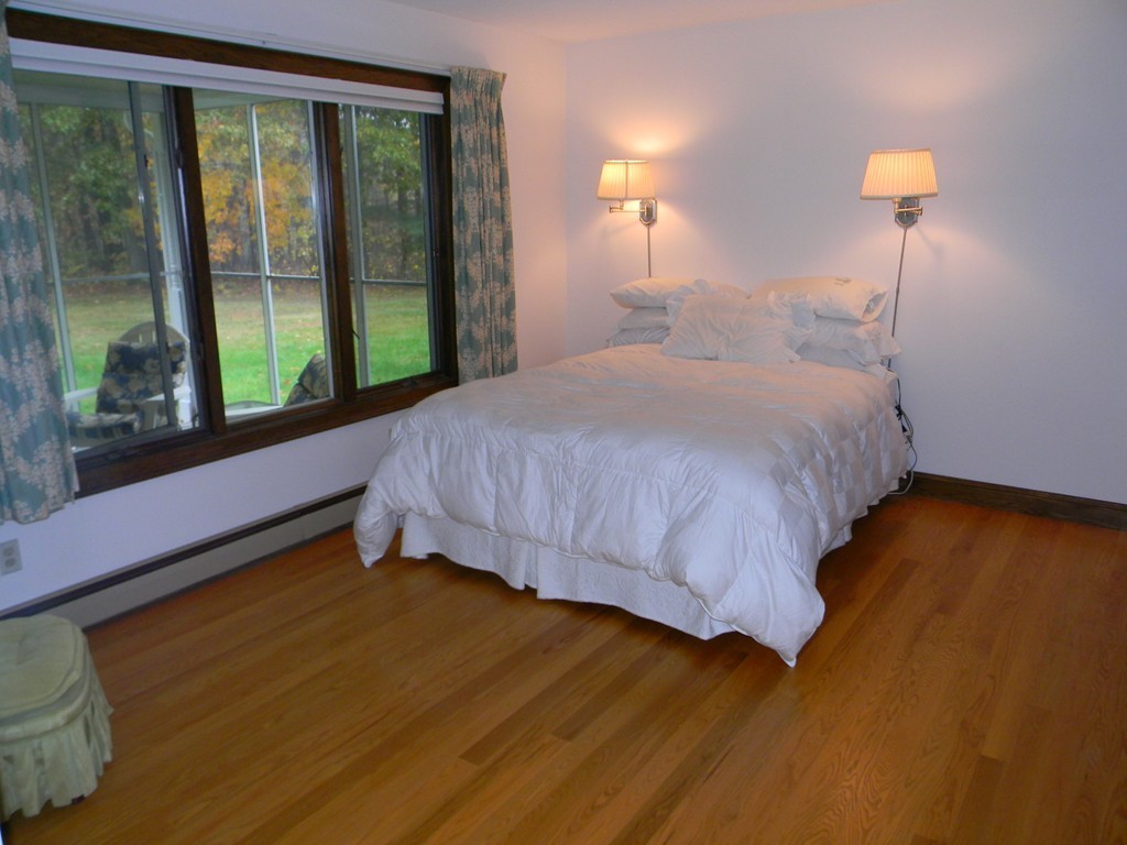 1170 Florence Road Northampton, MA 01062 - Photo 22 of 25 a bedroom with a bed and window