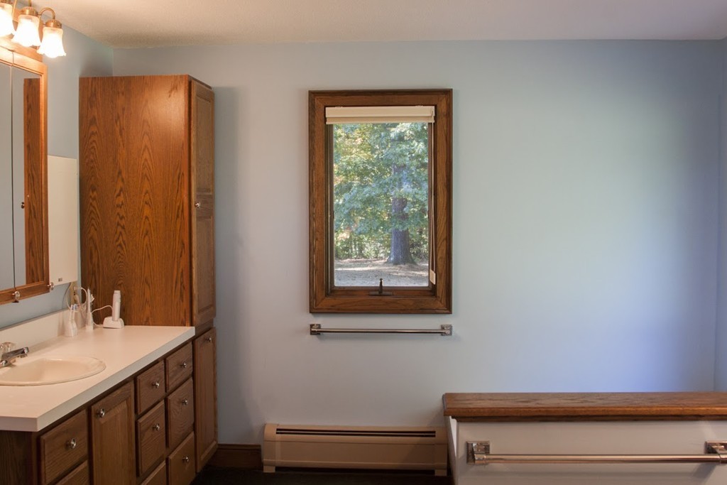 1170 Florence Road Northampton, MA 01062 - Photo 23 of 25 a bathroom with a sink a vanity and a mirror