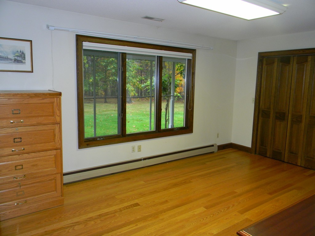 1170 Florence Road Northampton, MA 01062 - Photo 24 of 25 a view of an empty room with a window
