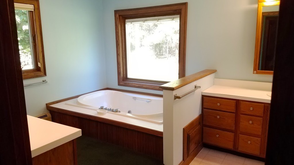 1170 Florence Road Northampton, MA 01062 - Photo 25 of 25 a bathroom with a sink and a window