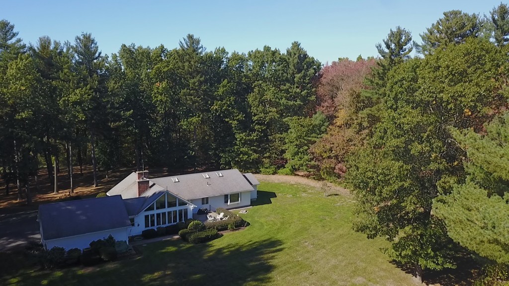 1170 Florence Road Northampton, MA 01062 - Photo 6 of 25 an aerial view of a house with swimming pool and yard