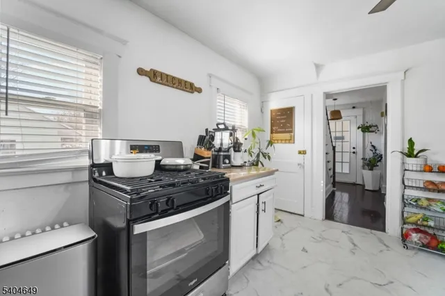 an aerial view of residential building and parking space