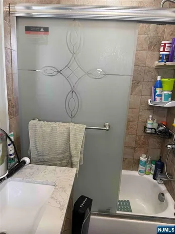 a bathroom with a sink and a bathtub