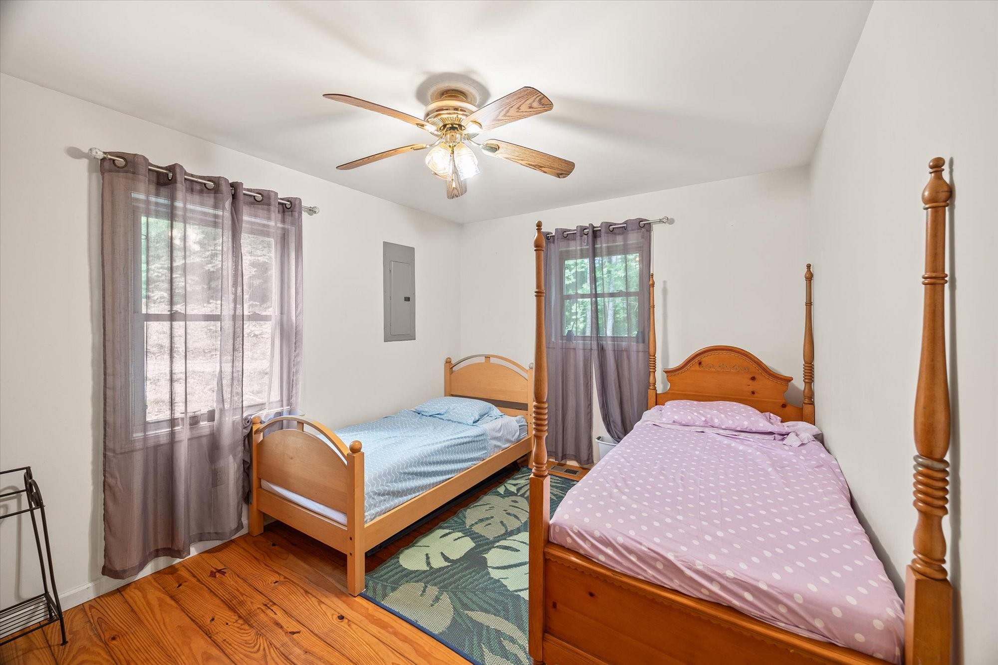 1103 Boles Beaty Road Alpine, TN 38543 - Photo 11 of 24 a bedroom with furniture and wooden floor