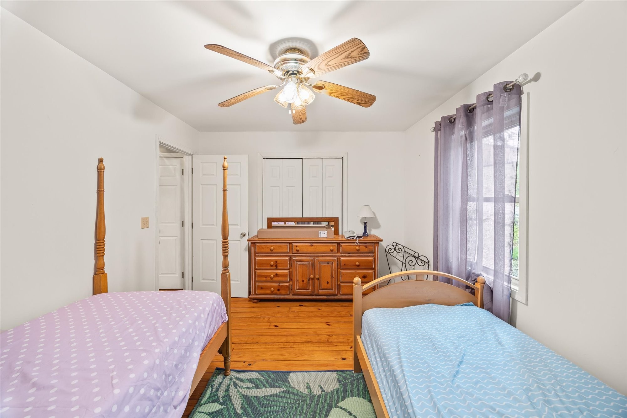 1103 Boles Beaty Road Alpine, TN 38543 - Photo 12 of 24 a bedroom with a bed and ceiling fan