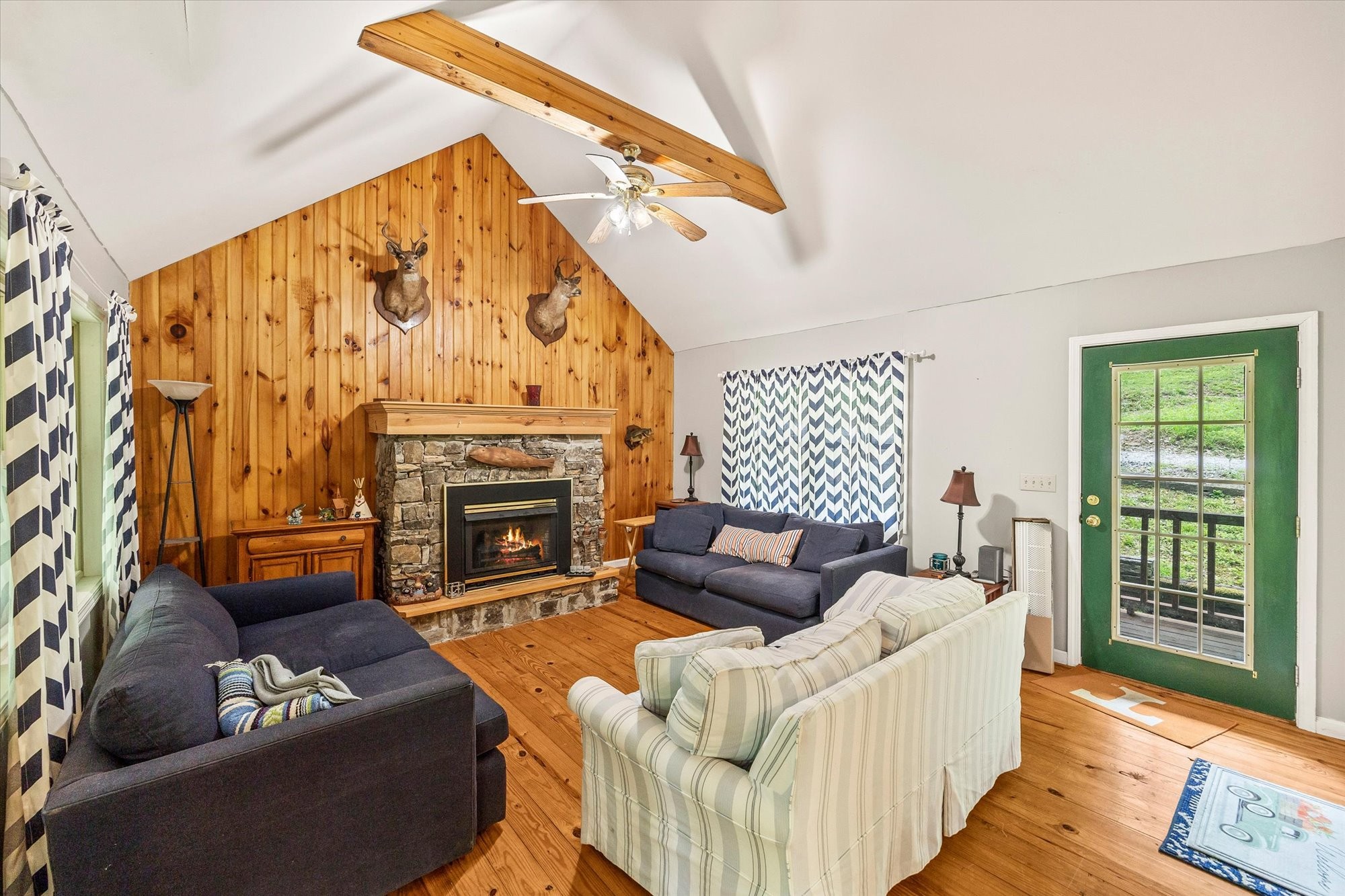 1103 Boles Beaty Road Alpine, TN 38543 - Photo 8 of 24 a living room with furniture and a fireplace