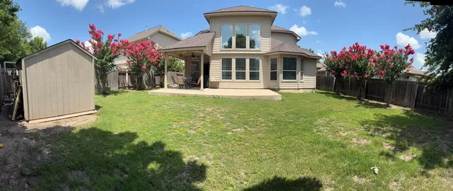 a front view of house with yard