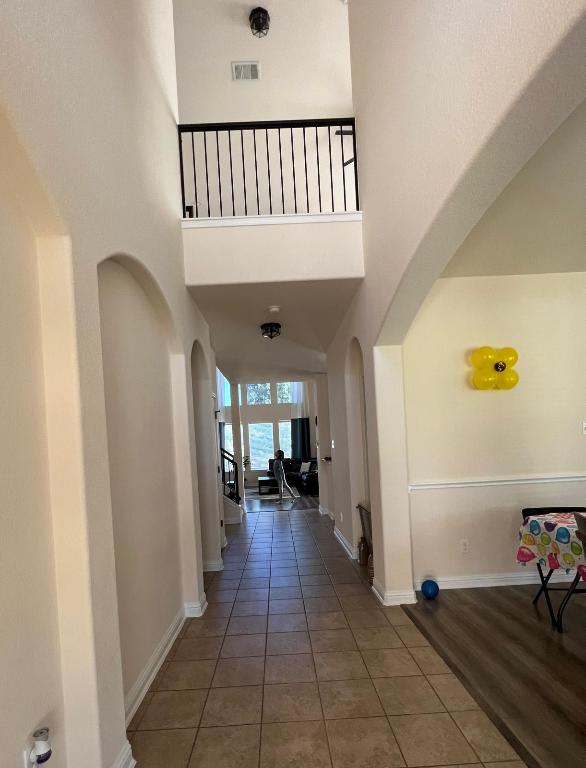 19413 Bridie Path Pflugerville, TX 78660 - Photo 8 of 26 a view of a hallway view with staircase