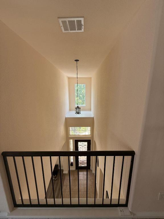 19413 Bridie Path Pflugerville, TX 78660 - Photo 9 of 26 a view of entryway with wooden floor