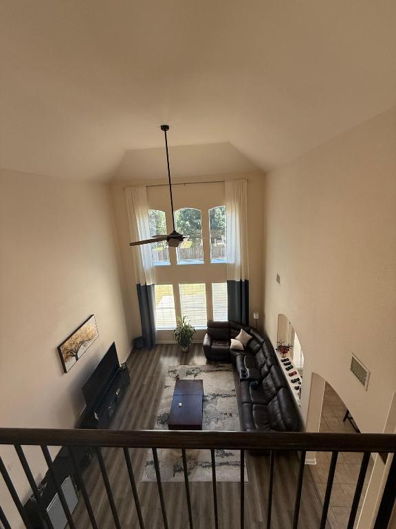 19413 Bridie Path Pflugerville, TX 78660 - Photo 10 of 26 a view of a workspace with furniture and a window