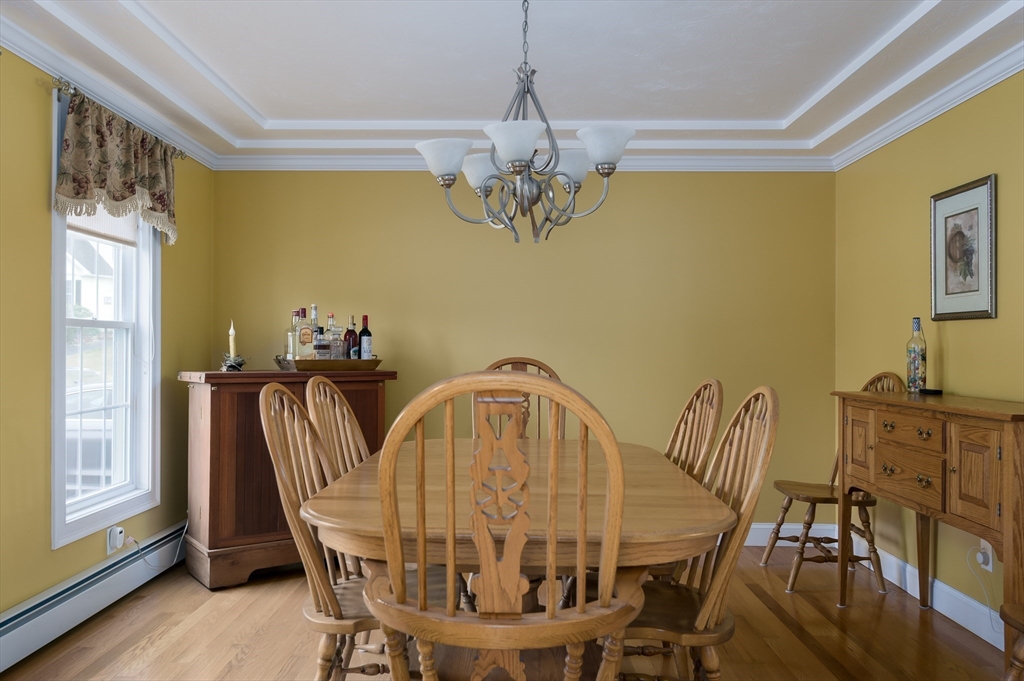 34 Marjorie Lane Rutland, MA 01543 - Photo 5 of 33 a view of a dining room with furniture window and wooden floor