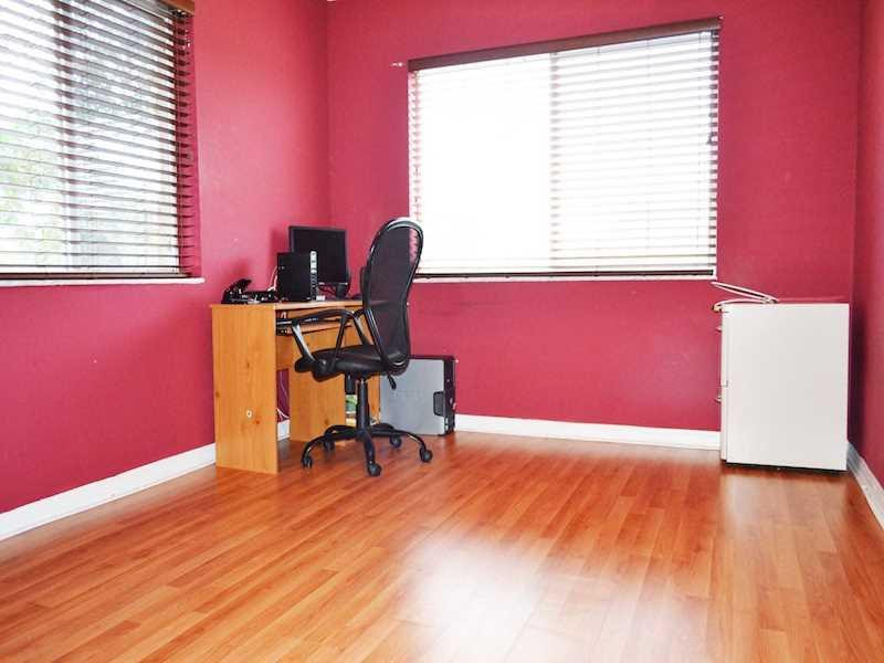 2899 Southwest 129th Terrace, Unit 2899 Miramar, FL 33027 - Photo 11 of 16 a workspace with furniture and a window