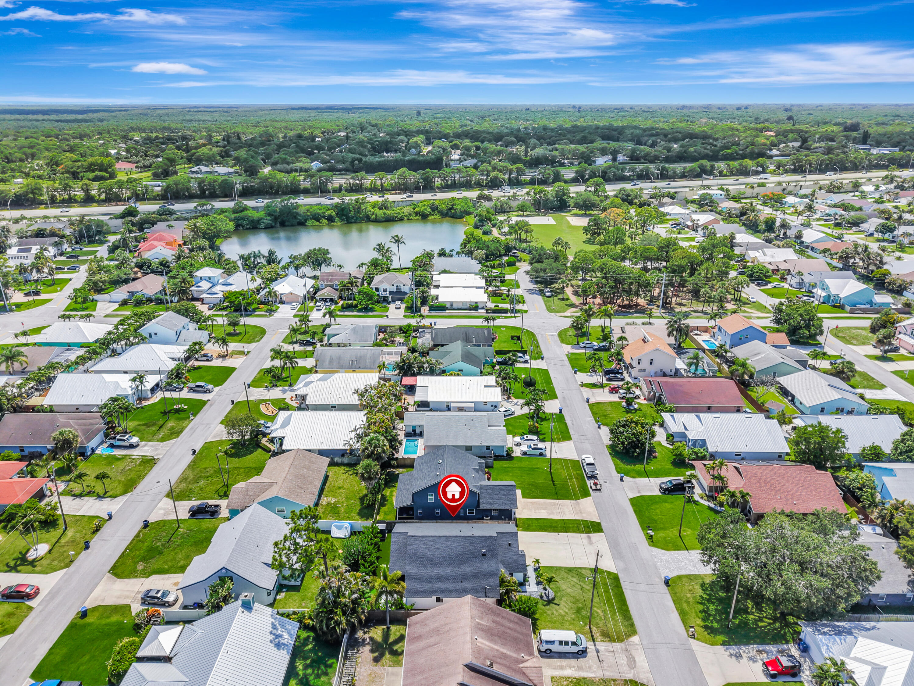 6312 Michael Street Jupiter, FL 33458 - Photo 60 of 66 DJI_20260608150916_0223_D