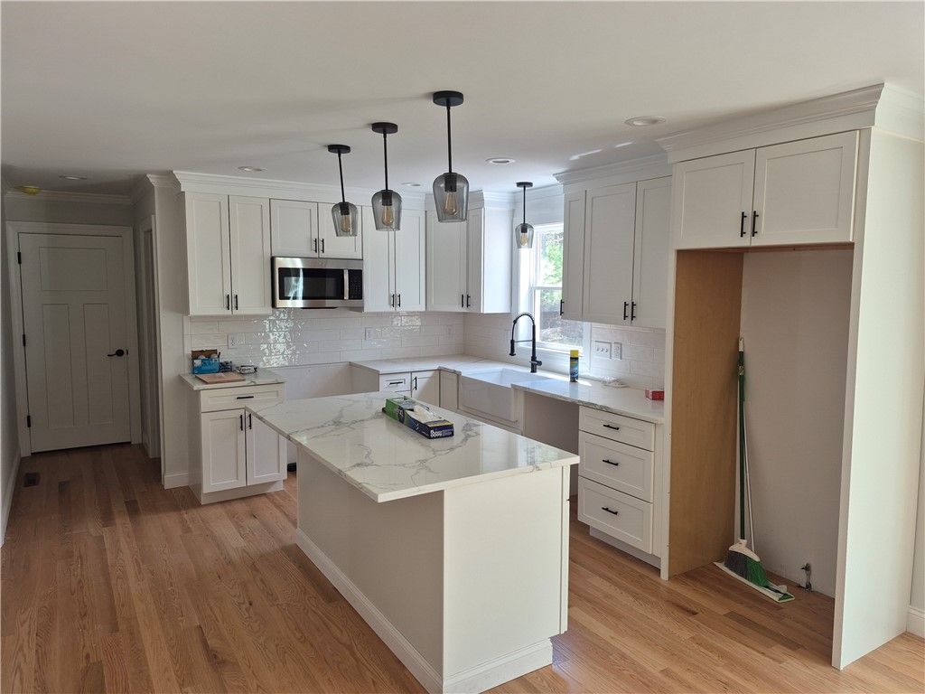 301 Switch Road Richmond, RI 02832 - Photo 4 of 24 Applianced Kitchen with Large Island and Dining Area