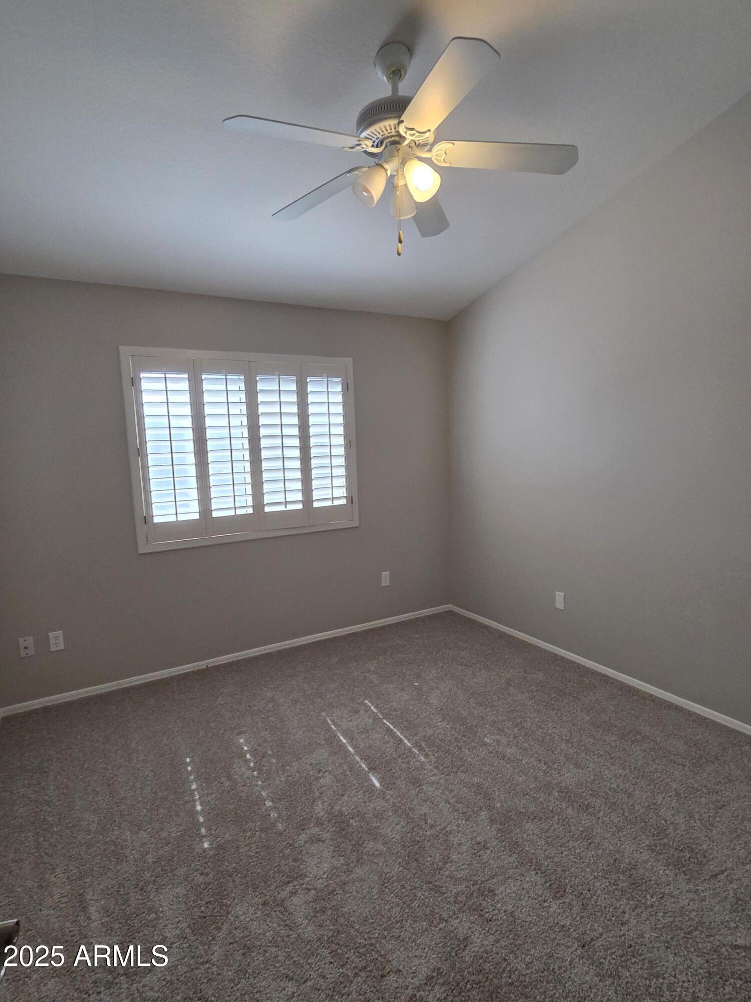 30651 North 44th Street Cave Creek, AZ 85331 - Photo 12 of 18 an empty room with a window
