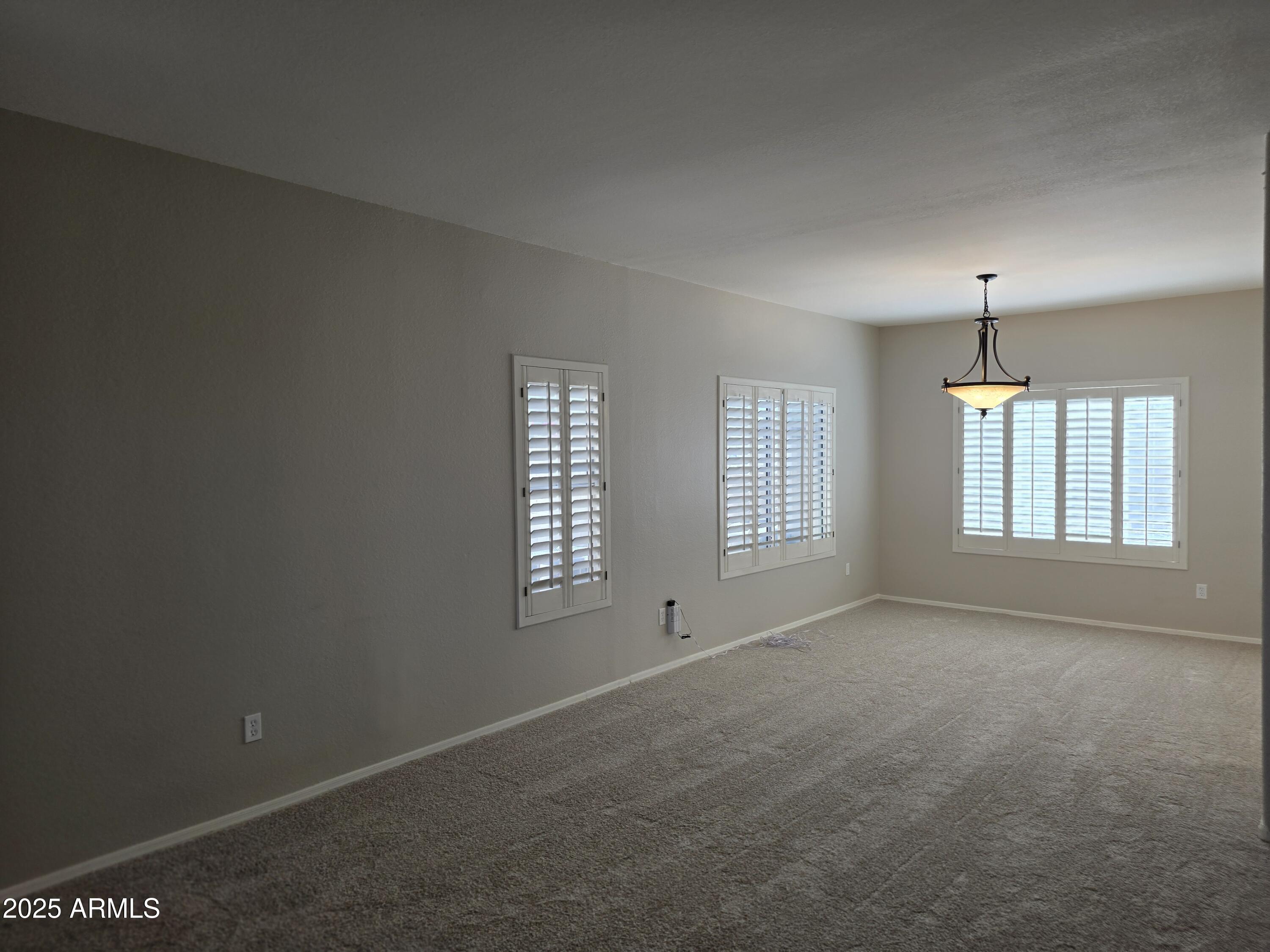 30651 North 44th Street Cave Creek, AZ 85331 - Photo 5 of 18 a view of an empty room with a window
