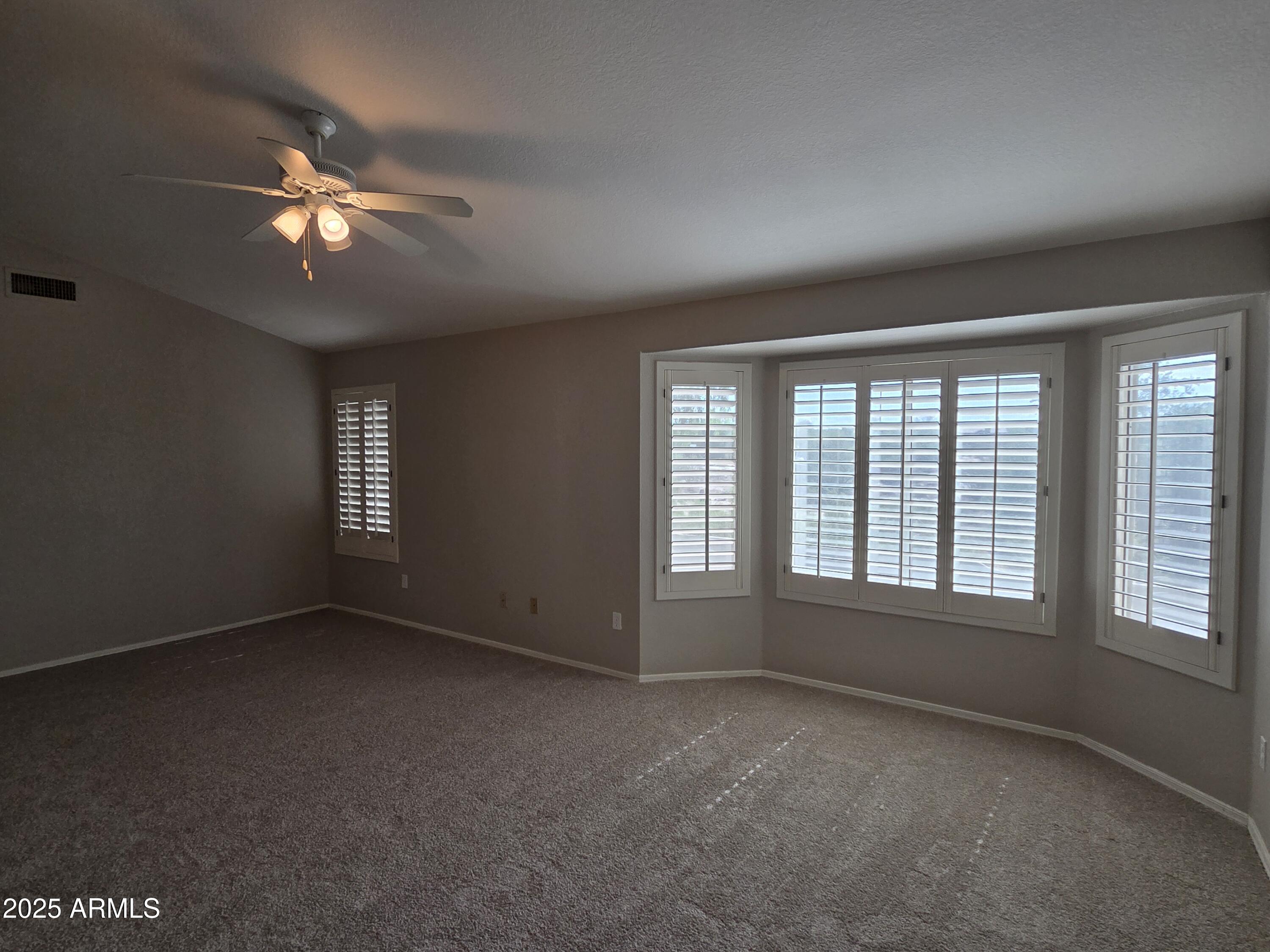 30651 North 44th Street Cave Creek, AZ 85331 - Photo 10 of 18 a view of empty room with window