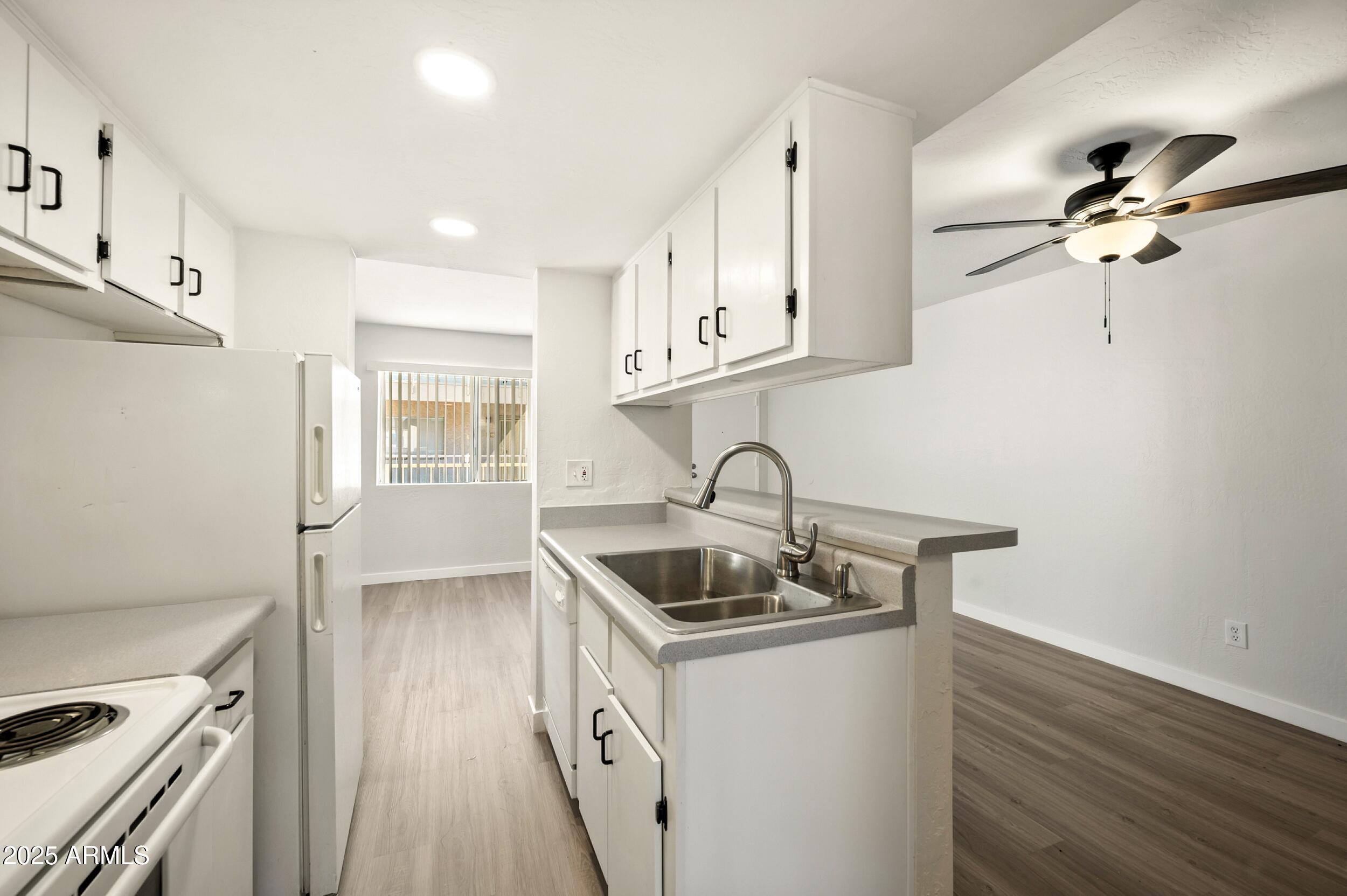 12123 West Bell Road, Unit 221 Surprise, AZ 85378 - Photo 3 of 18 221 Galley Kitchen B