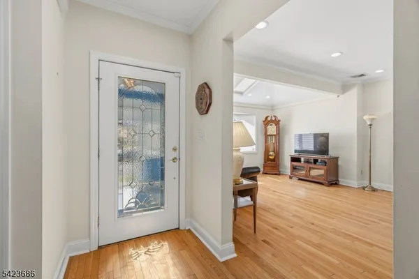 a room with furniture and a wooden floor