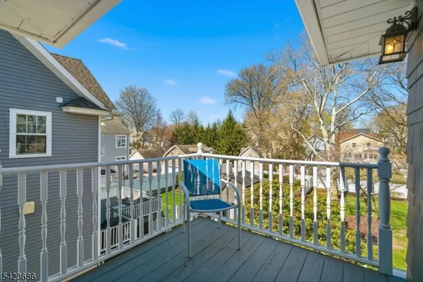 a view of balcony with furniture