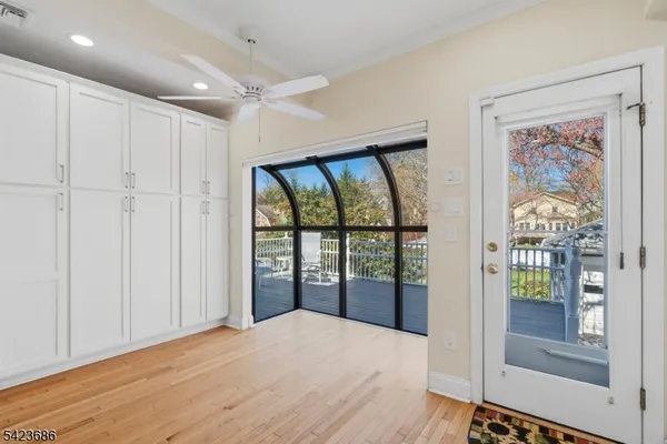 a view of a room with a large window