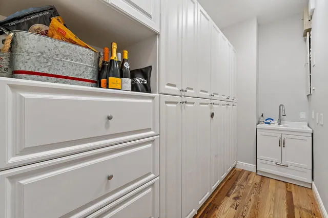 a bathroom with a shower and a sink
