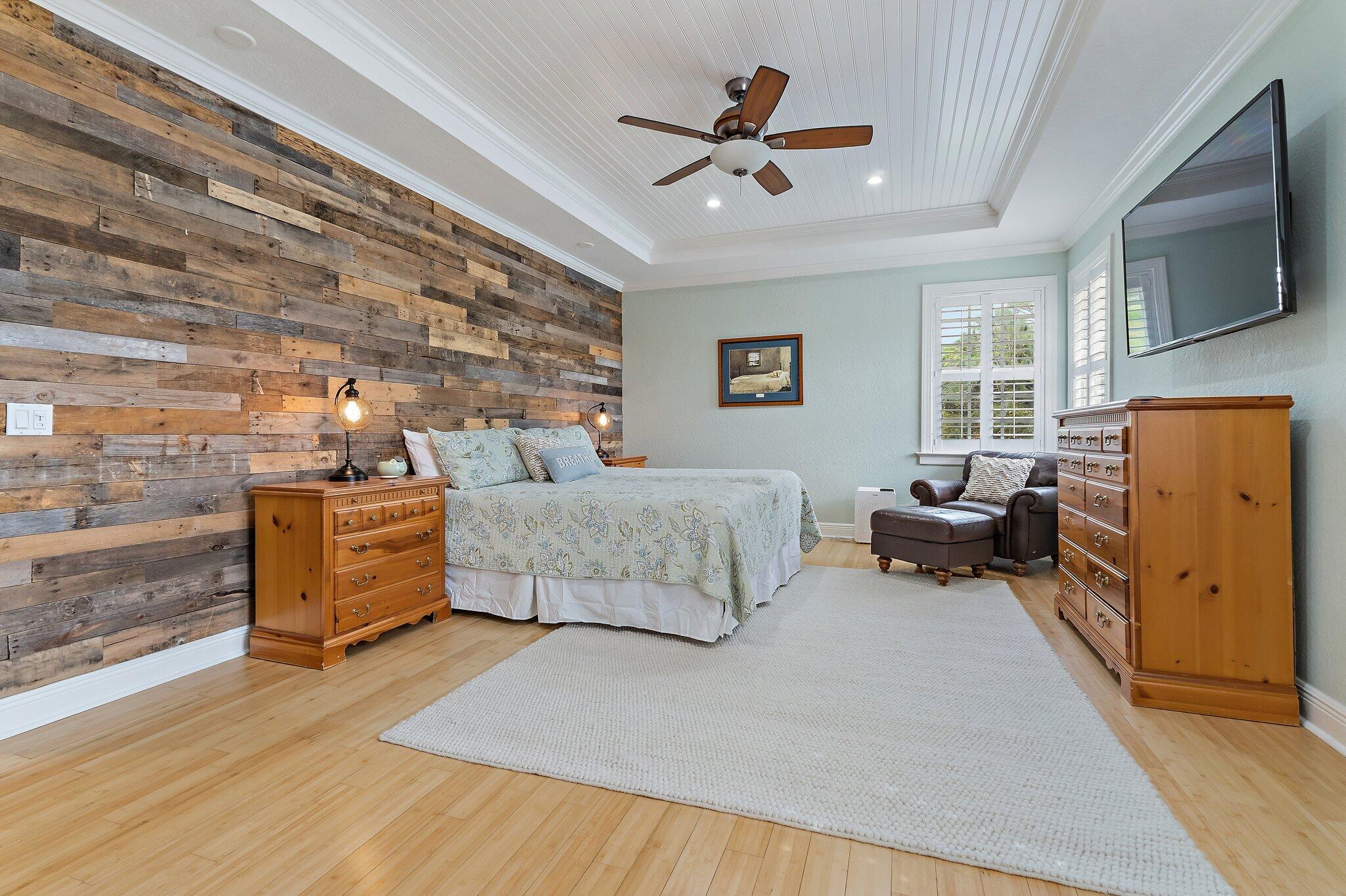 136 Via Catalunha Jupiter, FL 33458 - Photo 32 of 64 a bedroom with furniture and a window