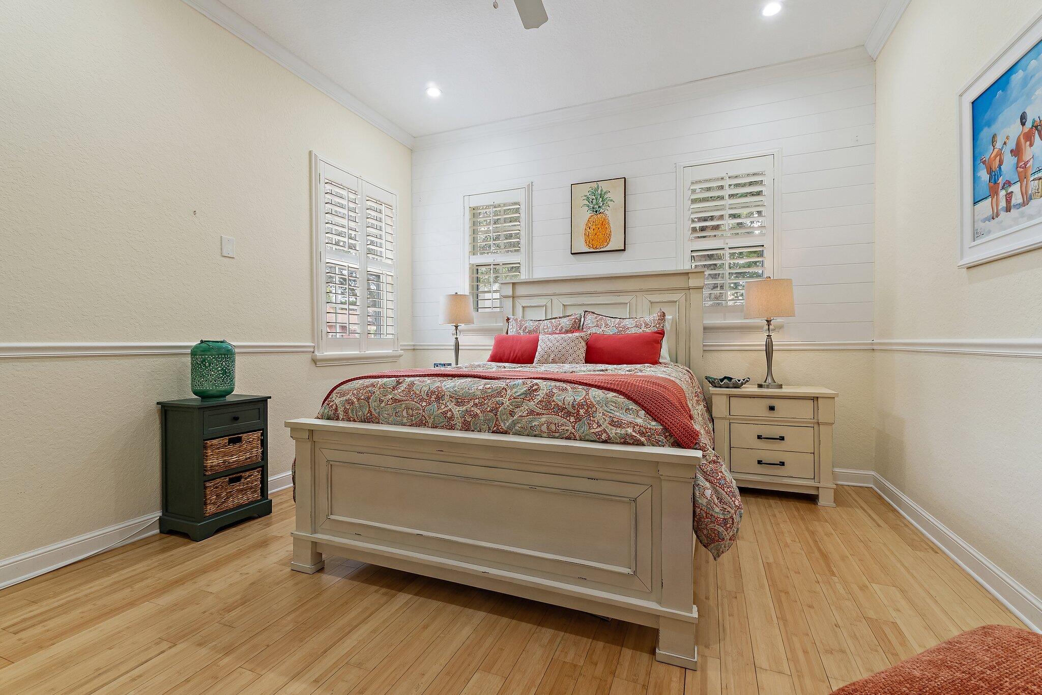 136 Via Catalunha Jupiter, FL 33458 - Photo 36 of 64 a bedroom with a bed and a tv