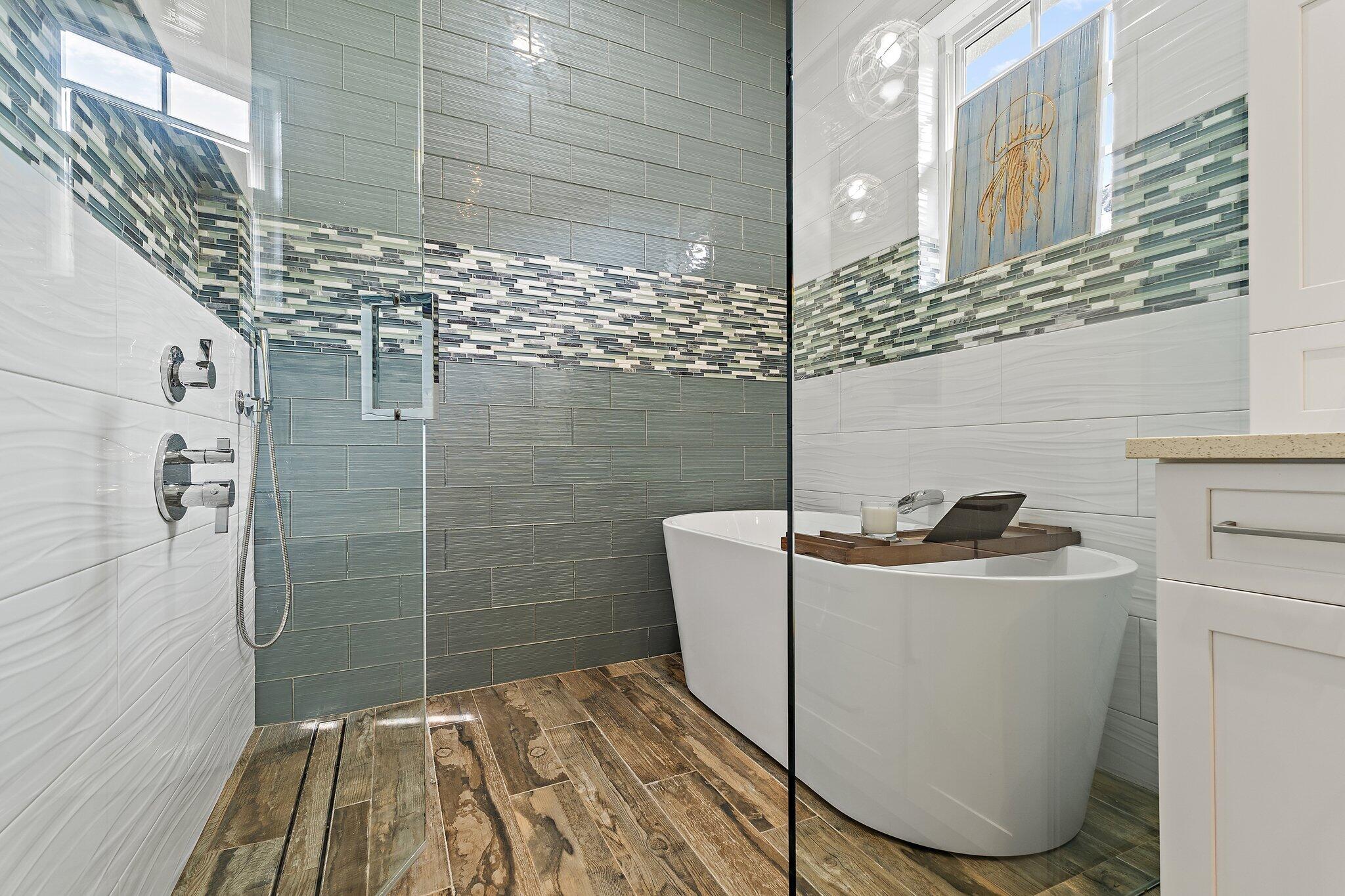 136 Via Catalunha Jupiter, FL 33458 - Photo 39 of 64 a bathroom with a sink toilet and shower