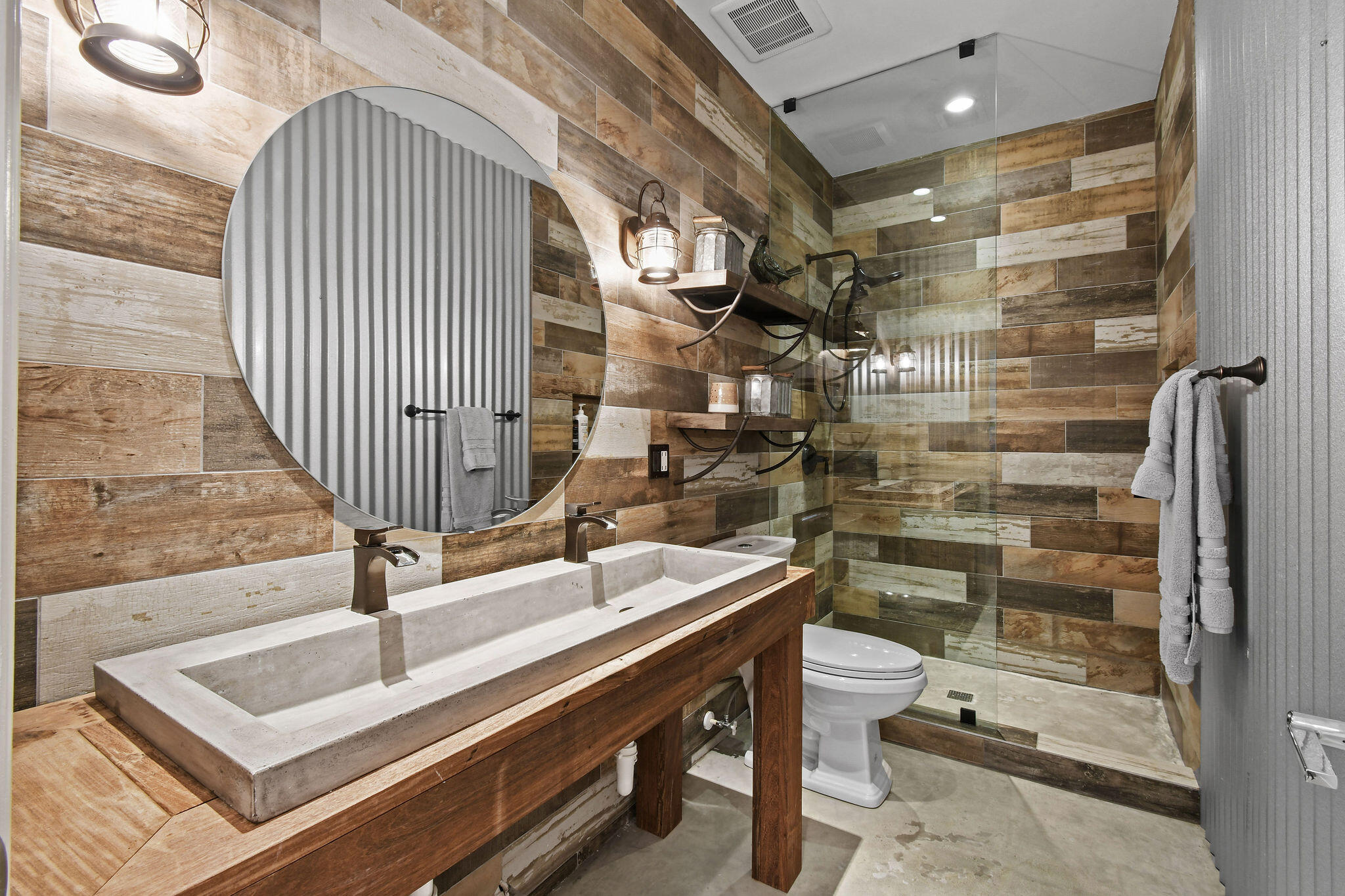 136 Via Catalunha Jupiter, FL 33458 - Photo 45 of 64 a bathroom with a sink and mirror