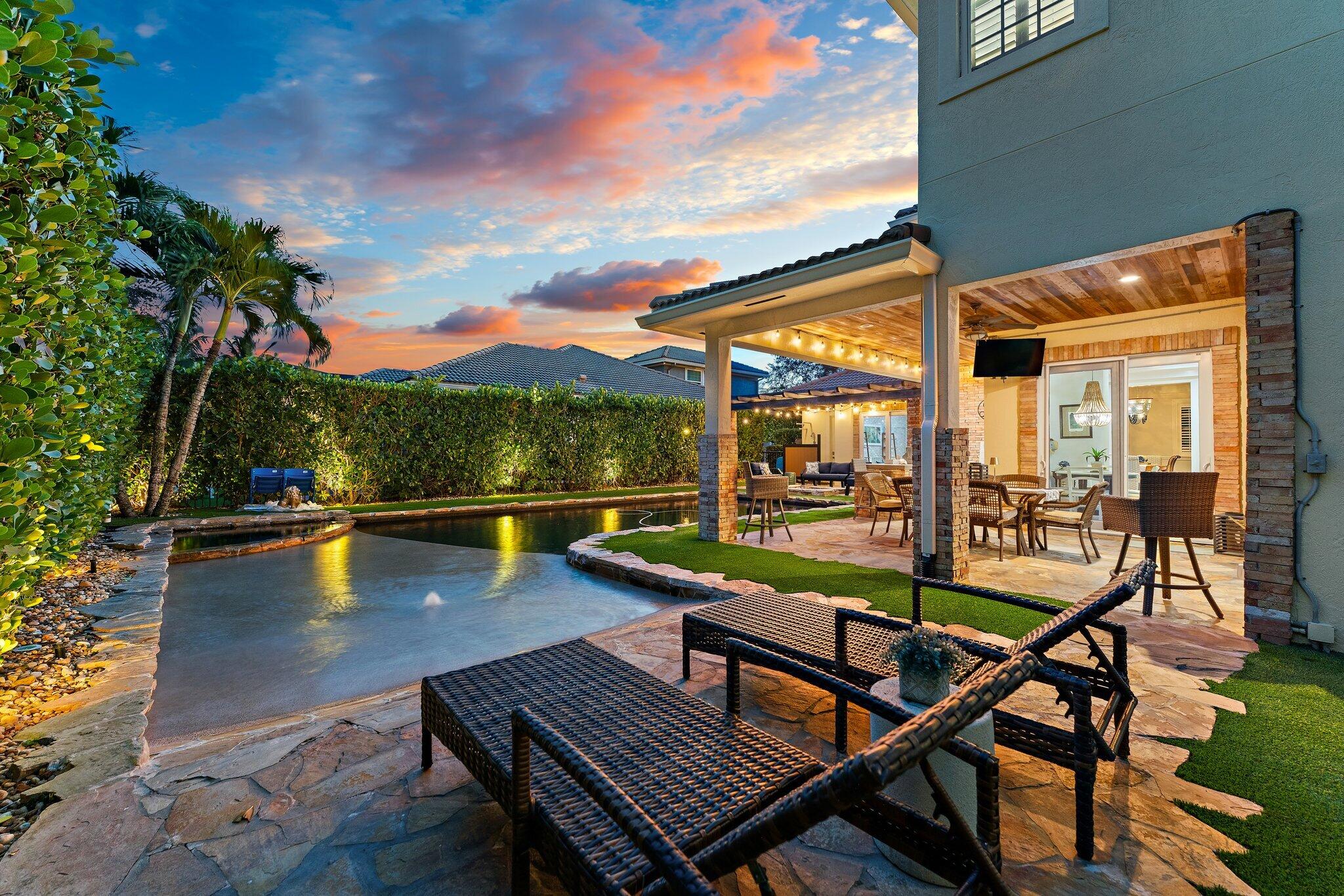 136 Via Catalunha Jupiter, FL 33458 - Photo 50 of 64 a view of swimming pool with seating area
