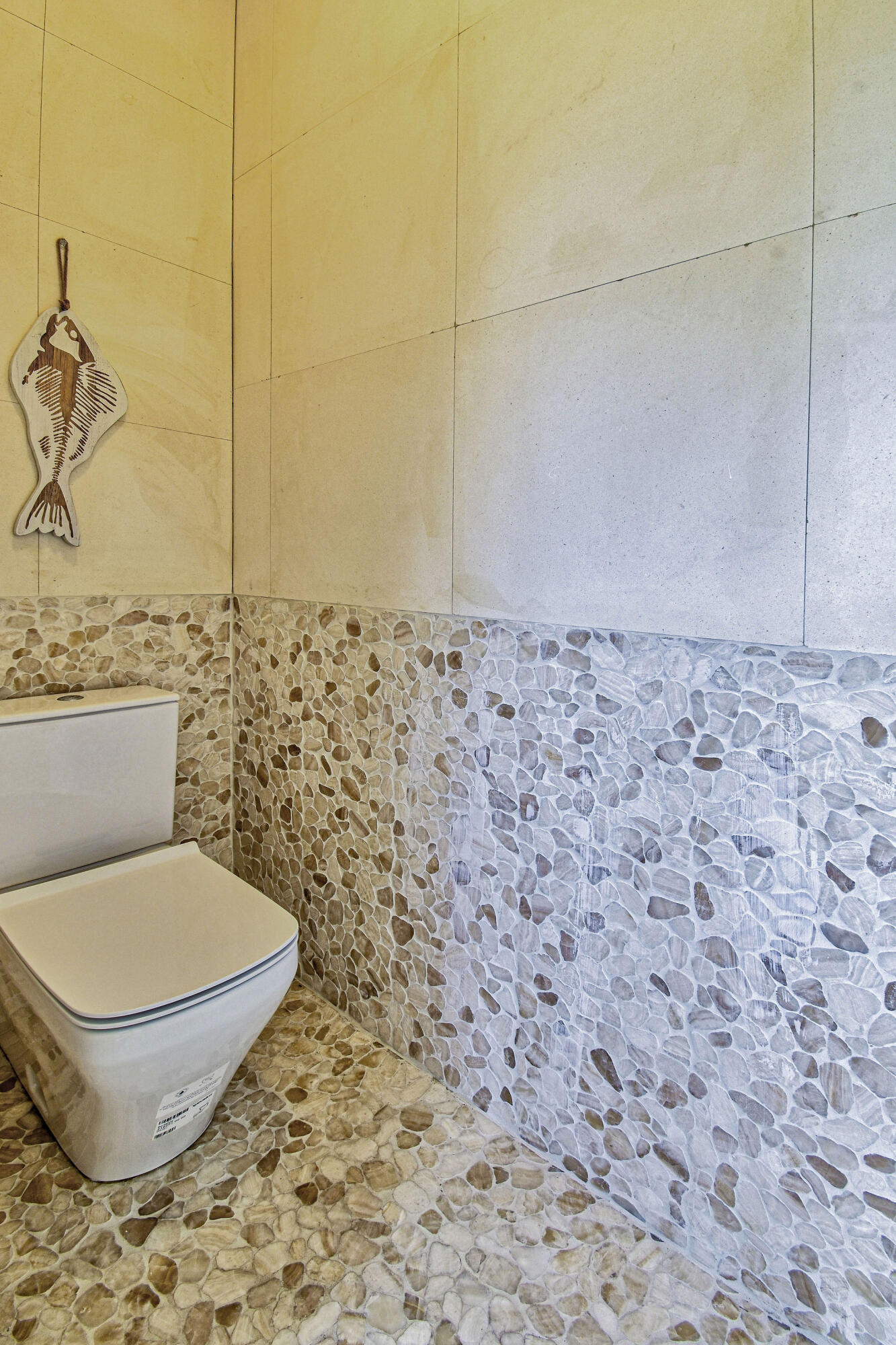 136 Via Catalunha Jupiter, FL 33458 - Photo 54 of 64 a bathroom with a toilet and a sink