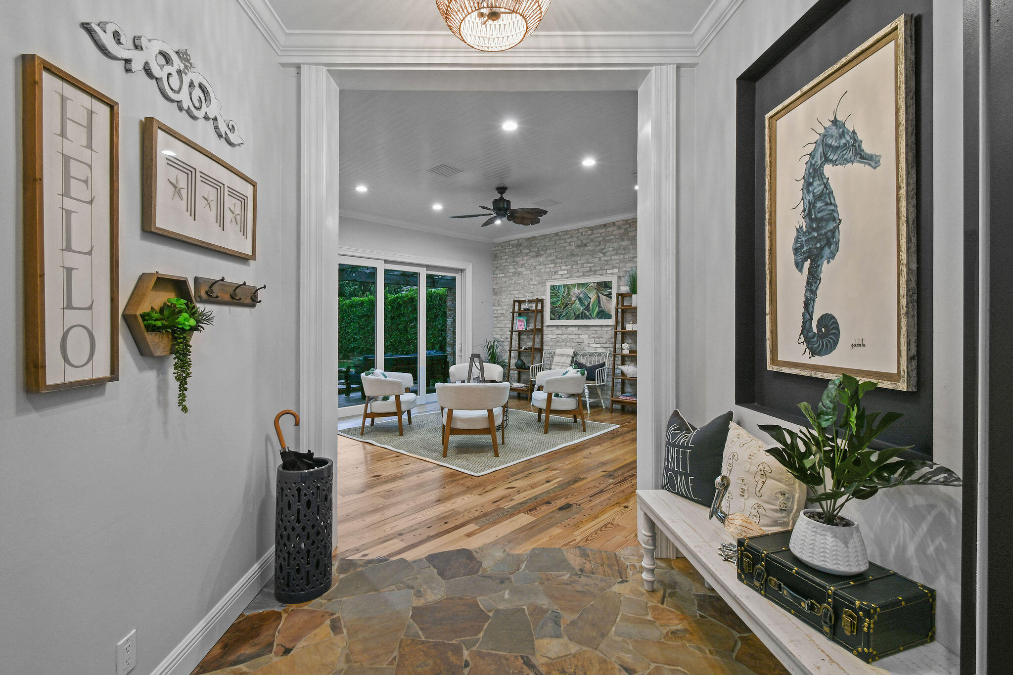 136 Via Catalunha Jupiter, FL 33458 - Photo 6 of 64 a living room with furniture and a potted plant
