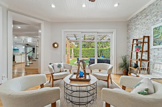 a view of a workspace with furniture and a workspace