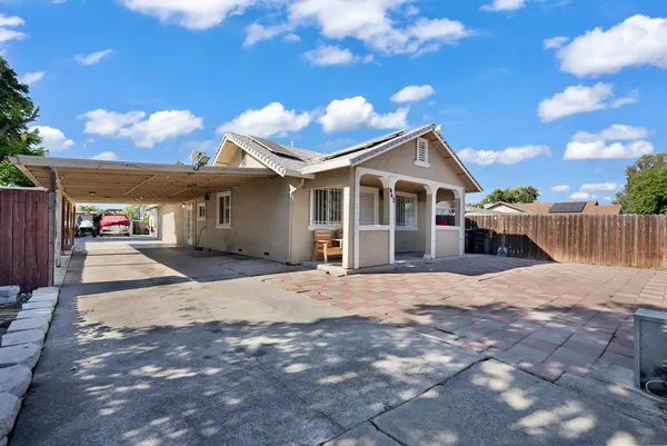 a front view of a house with a entertaining space