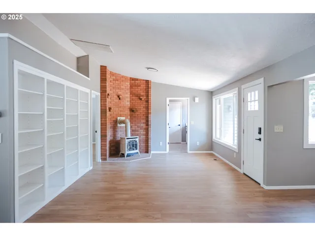 a view interior of a house with wooden floor and windows