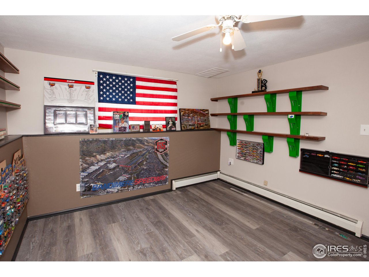 538 California Street Sterling, CO 80751 - Photo 22 of 33 a living room with furniture and a wooden floor