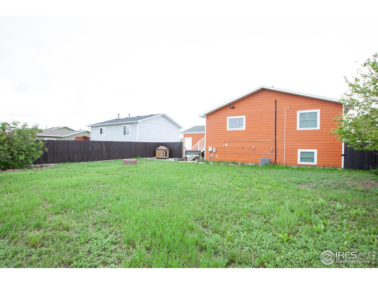 538 California Street Sterling, CO 80751 - Photo 33 of 33 a backyard of a house with lots of green space