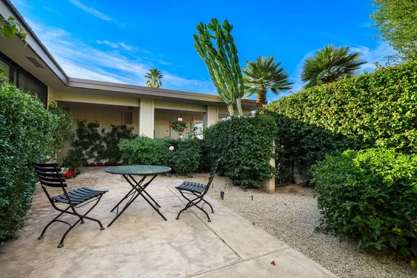 a front view of a house having yard