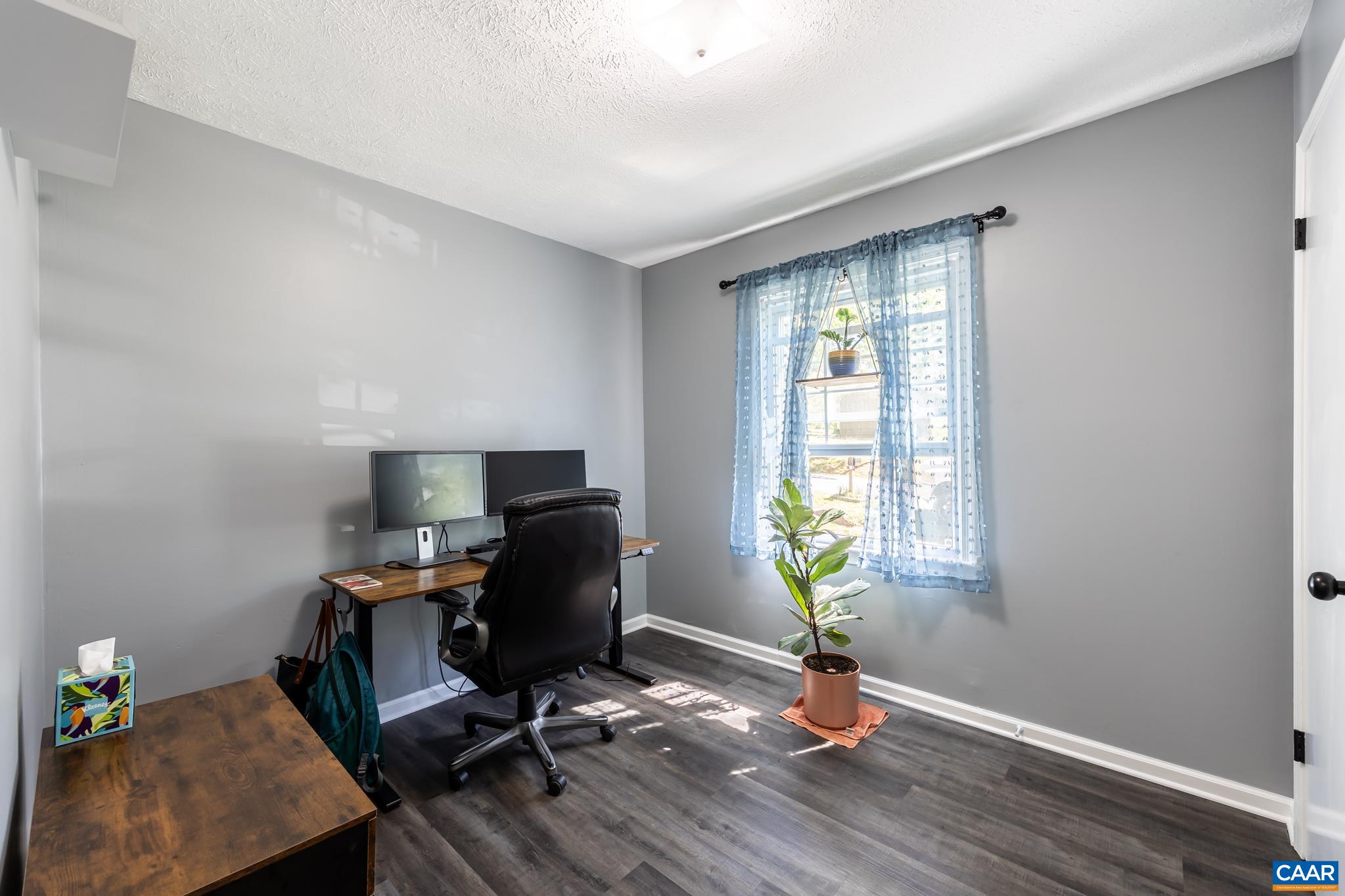 100 Holmes Run Road Stanardsville, VA 22973 - Photo 11 of 22 a view of a workspace with furniture and a window
